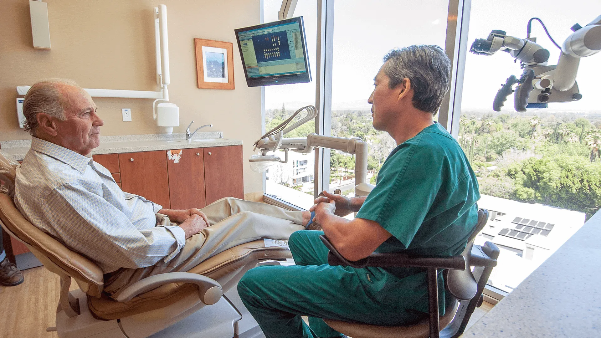 Dr. Matthew talking to patient