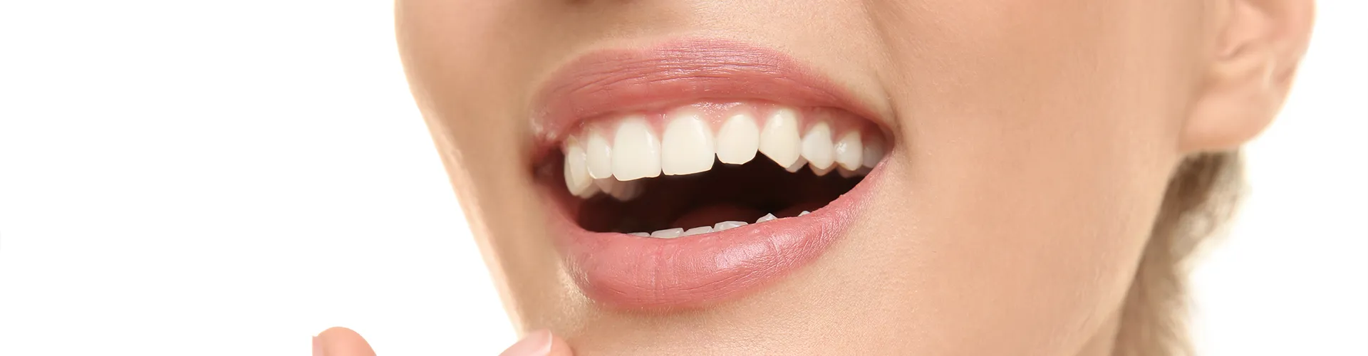 smiling woman touching her chin