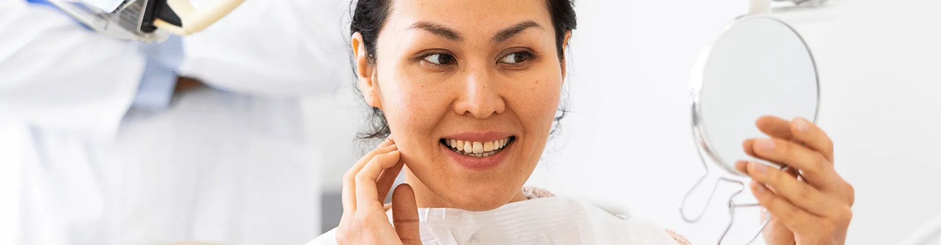 Women Smiling in the dentis