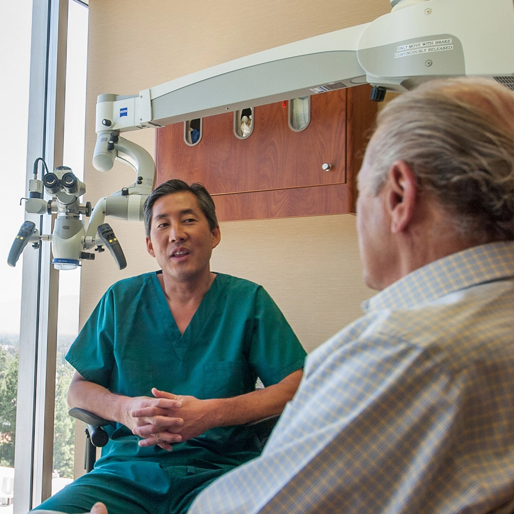 Dr. Matthew talking to patient