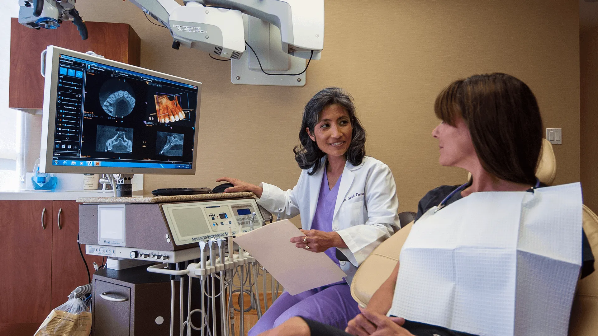 Dr. Cynthia talking to patient