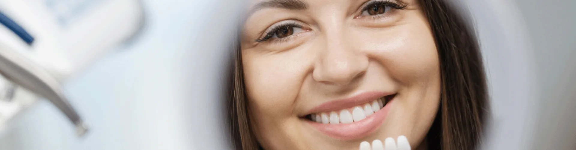 Woman smiling at the mirror