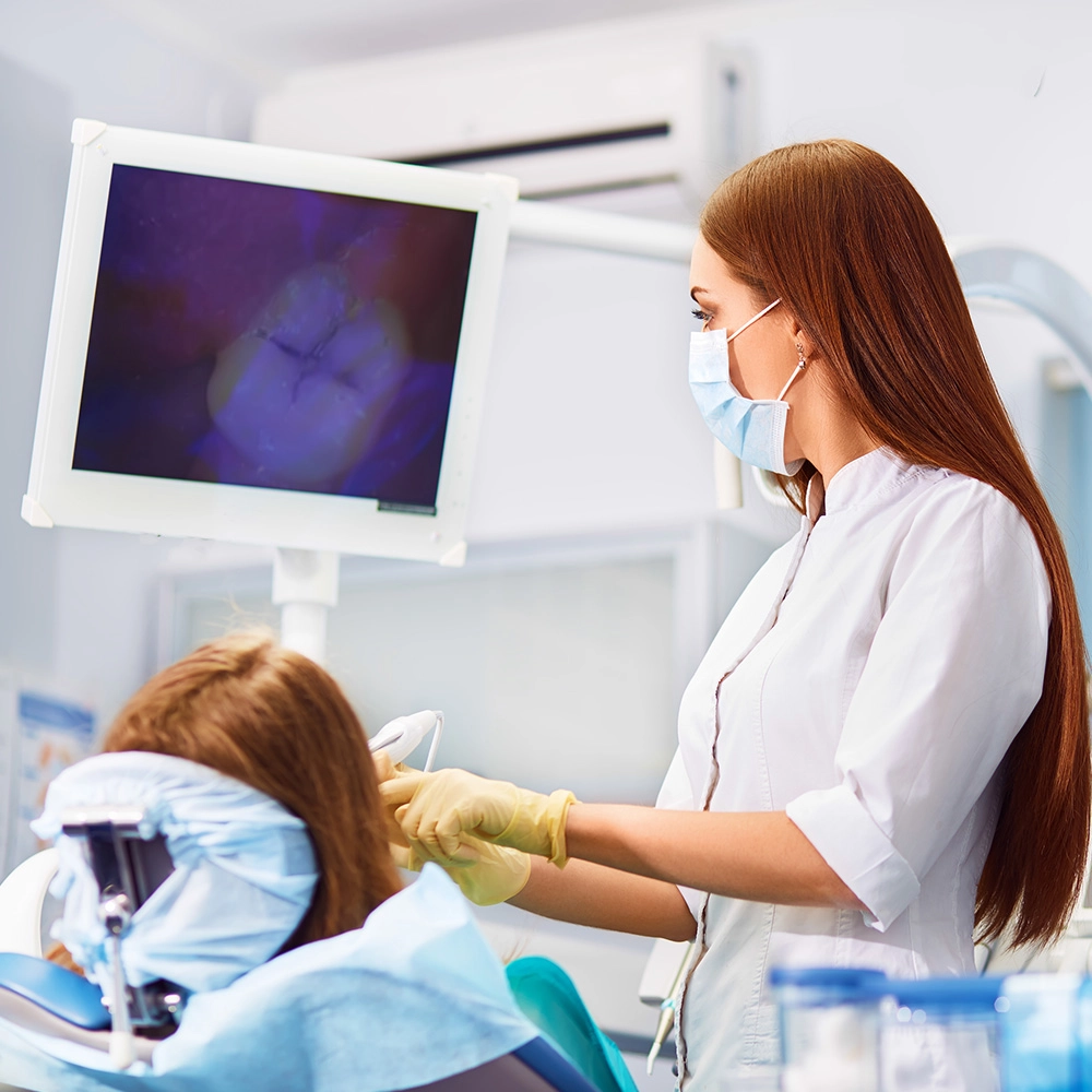 Dentist performing check-up