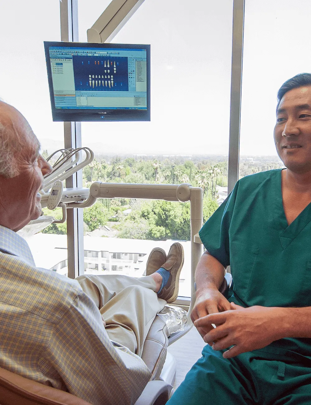 Dr. Matthew talking to patient